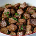 Crockpot Garlic Butter Steak Bites – Your New Favorite 2 Crockpot Garlic Butter Steak Bites served in bowl