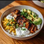 Street Corn Chicken Rice Bowl – Easy, Zesty, Addictive 2 street corn chicken rice bowl served with lime wedges and fresh cilantro